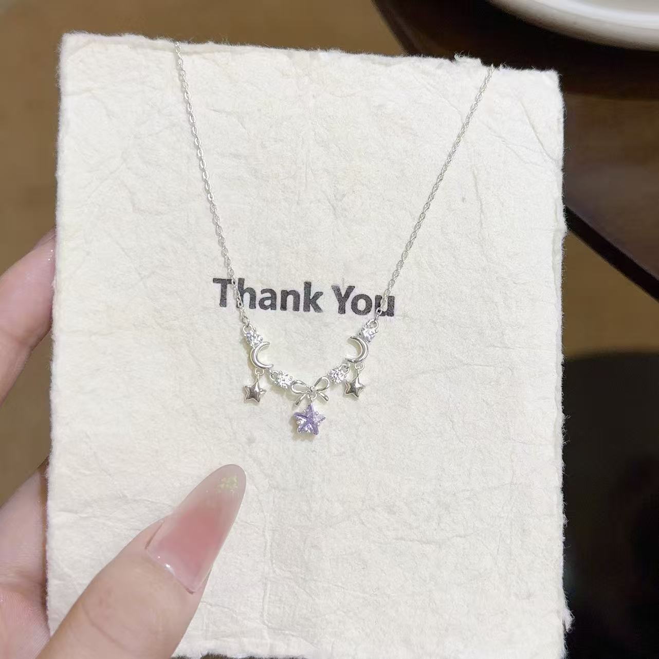 Titanium steel purple cherry star and moon necklace with star and bow design, niche light luxury exquisite versatile ins-style clavicle chain pendant for women