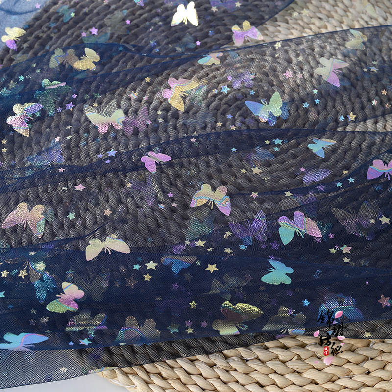 幻彩蝴蝶星星纱布料 女童连衣裙公主裙彩色印花网纱面料手工diy纱