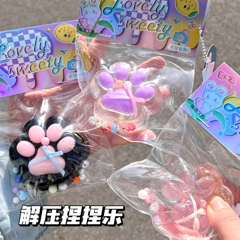 Pequeño libro rojo con el mismo estilo, grandes garras de gato perla, pellizcos, juguetes de descompresión, niña linda, artefacto de descompresión divertido al por mayor