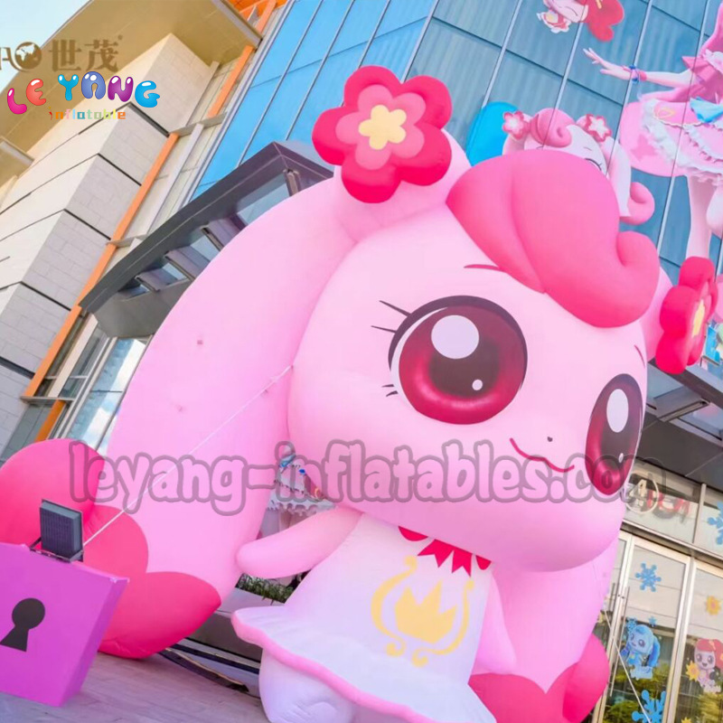 元旦商场开张周年庆典美陈装饰喜庆粉色卡通迎宾气模地标气模定制