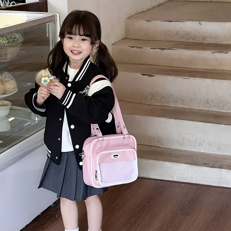 Paquete de dolor de comida de dos dimensiones japonesa 2025 nuevo paquete de hombro transparente para niños y niñas bolsas animadas de moda para niños
