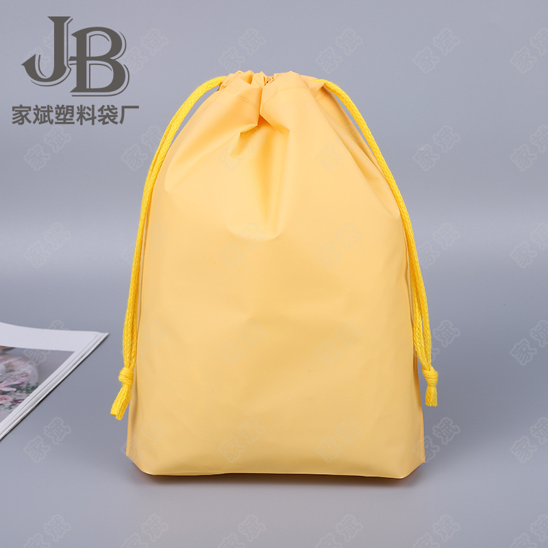 En stock al por mayor Eva esmerilado cordón bolsa color caramelo Almacenamiento de viaje ropa para niños bolsa de plástico cordón