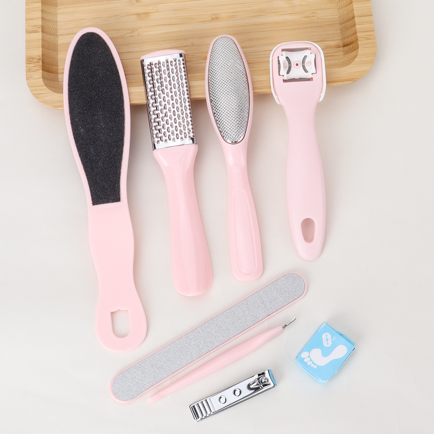 Conjunto de herramientas de pedicura rosa de 8 piezas de archivo de acero inoxidable para eliminar la piel muerta y el callo para el cuidado de los pies.