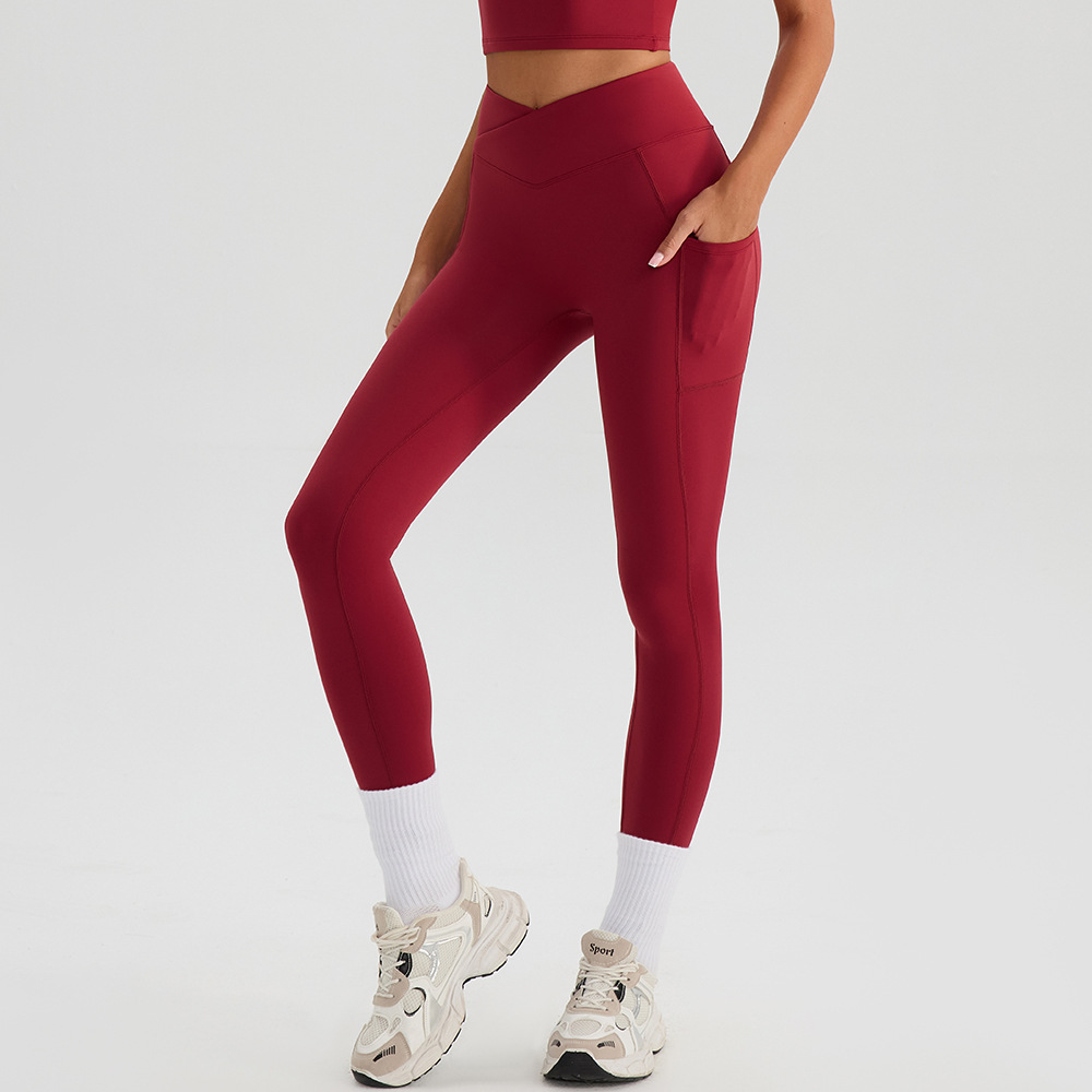 Verano desnudo sensación de secado rápido acondicionamiento físico de doble bolsillo correr pantalones deportivos de forma de cuerpo de cintura alta cintura cruzada pantalones de yoga