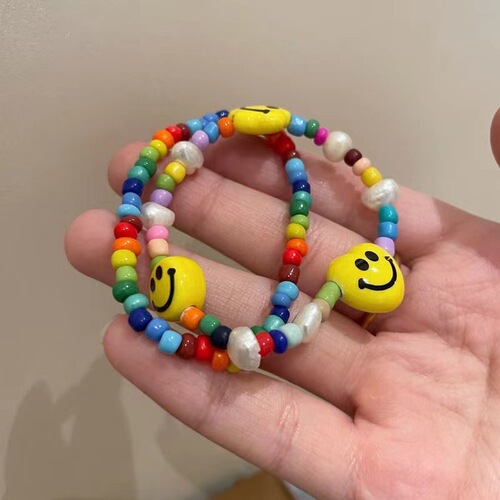 New colored beaded smiley bracelet for women ins niche design student best friend elastic rope bracelet for fashionable dopamine
