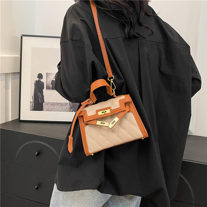 Bolsos transfronterizos para mujer 2024 nuevo bolso de hombro de todo fósforo de moda de nicho bolso de mensajero de color de contraste de rombo de textura de alta calidad