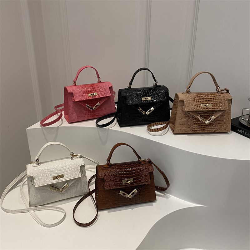 Bolso de mano con textura de nicho francés 2025 nuevo bolso femenino moda simple bolso de mensajero arte popular Kylie