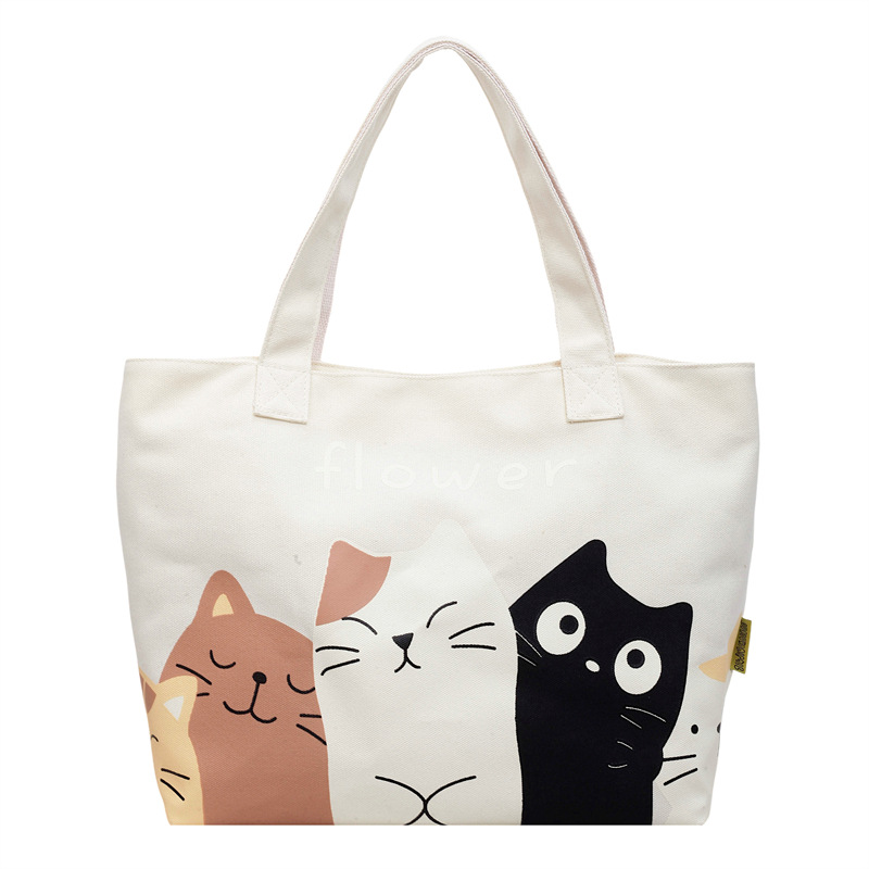 Bolsa de lona para mujeres 2026 nuevo estilo simple de moda lindo gatito patrón de oficina mochila de viaje