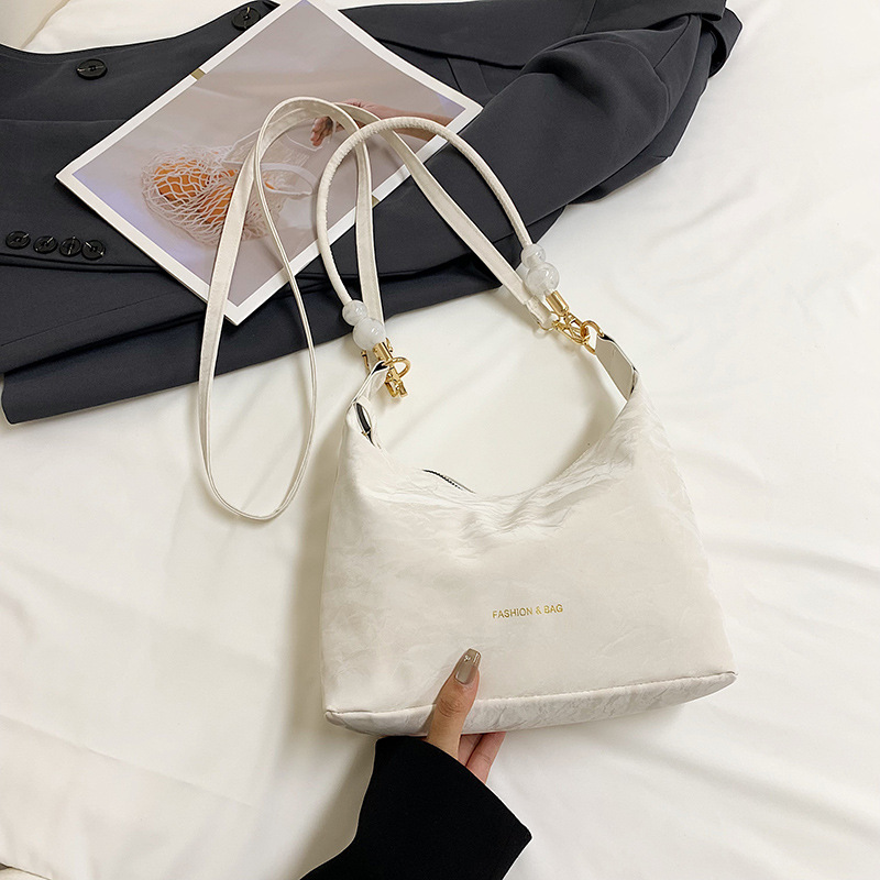 Bolsos de nicho de diseño de alta calidad para mujeres 2024 nuevo bolso de mano, bolso de hombro de moda, bolso de brazo