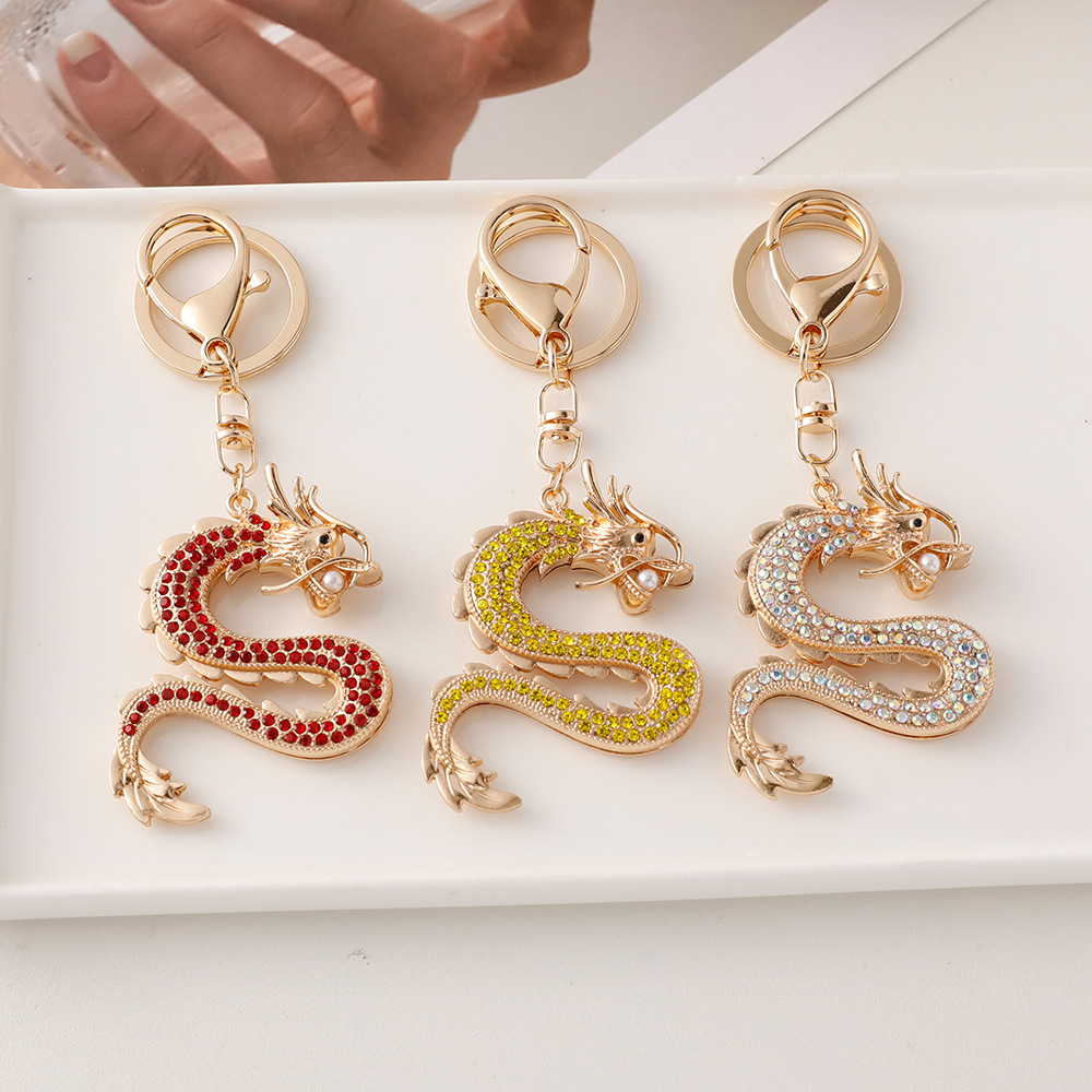 Estilo chino diamante incrustado suerte doce Zodiaco dragón estilo llavero animal año bolsa colgante metal dragón accesorios del coche
