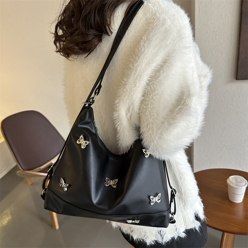 Bolsa de hombro de textura de la atmósfera en línea para mujeres 2023 otoño y invierno nueva bolsa de brazo coreana para mujeres bolso especial