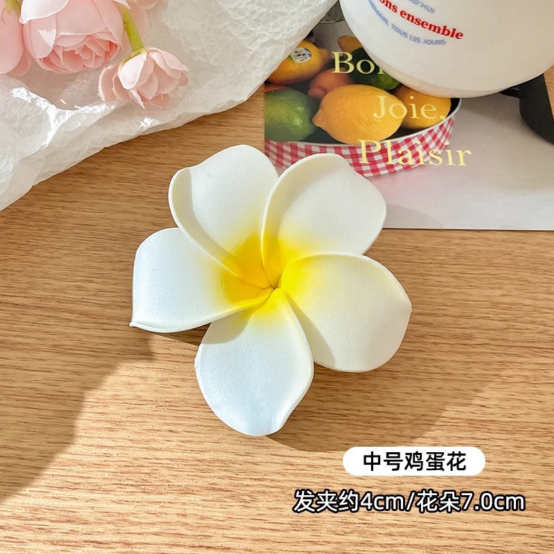 Coreano dulce perla huevo flor de pelo de vacaciones de flores de vacaciones de playa pinzas de cabello de flores
