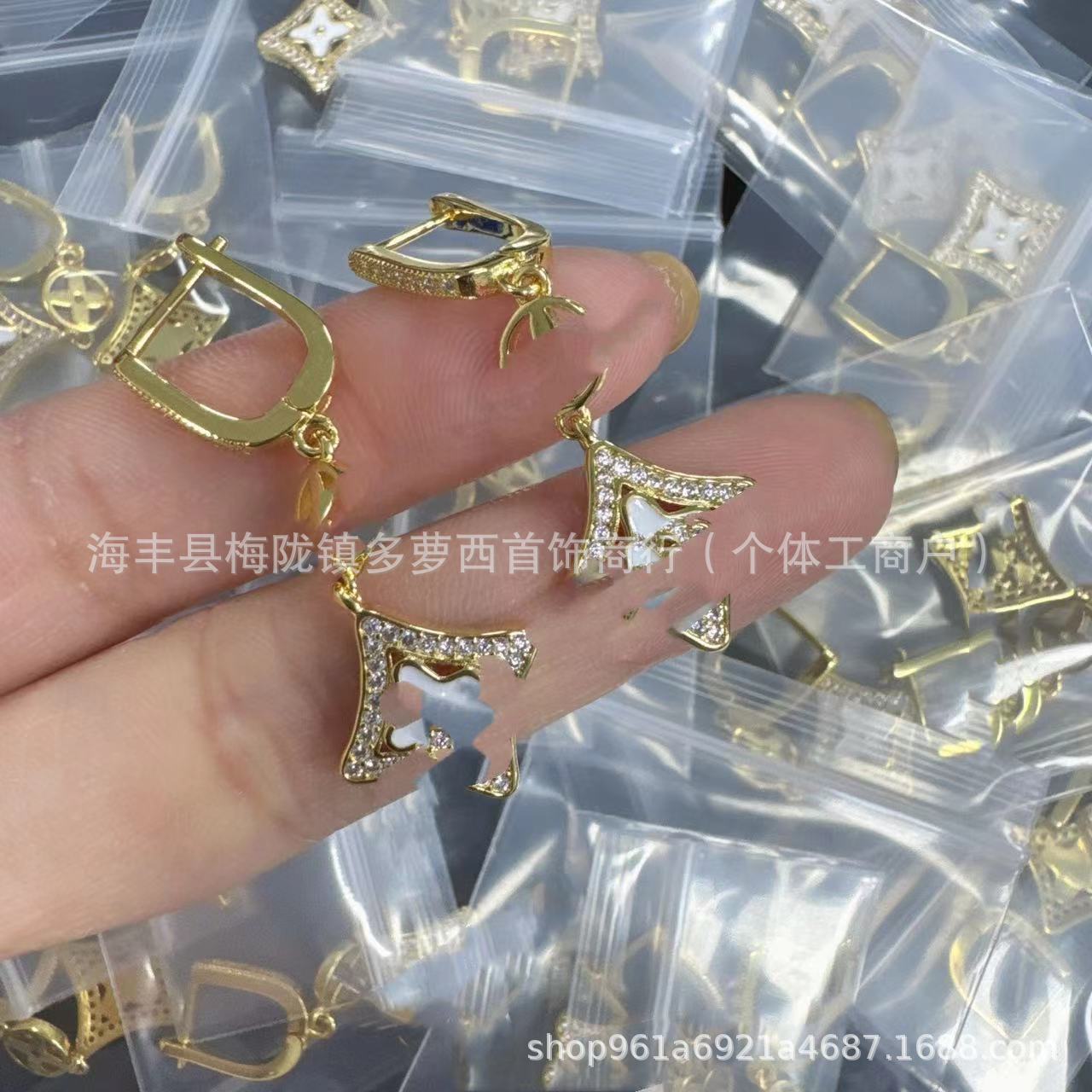 Quality classic fashionable earrings with letters