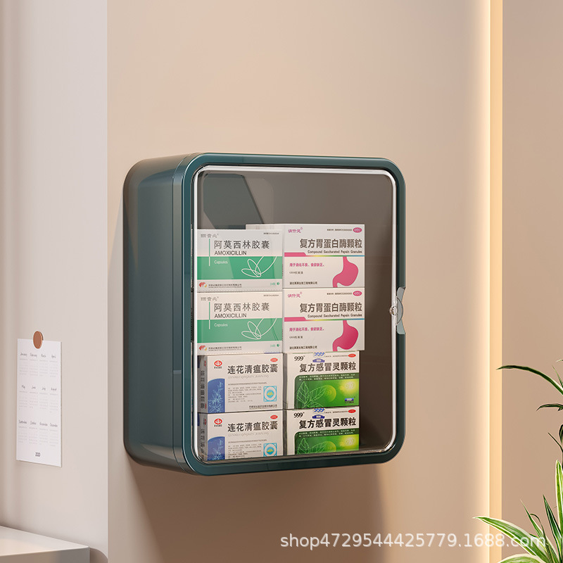 진한 녹색 벽걸이형 알약 상자