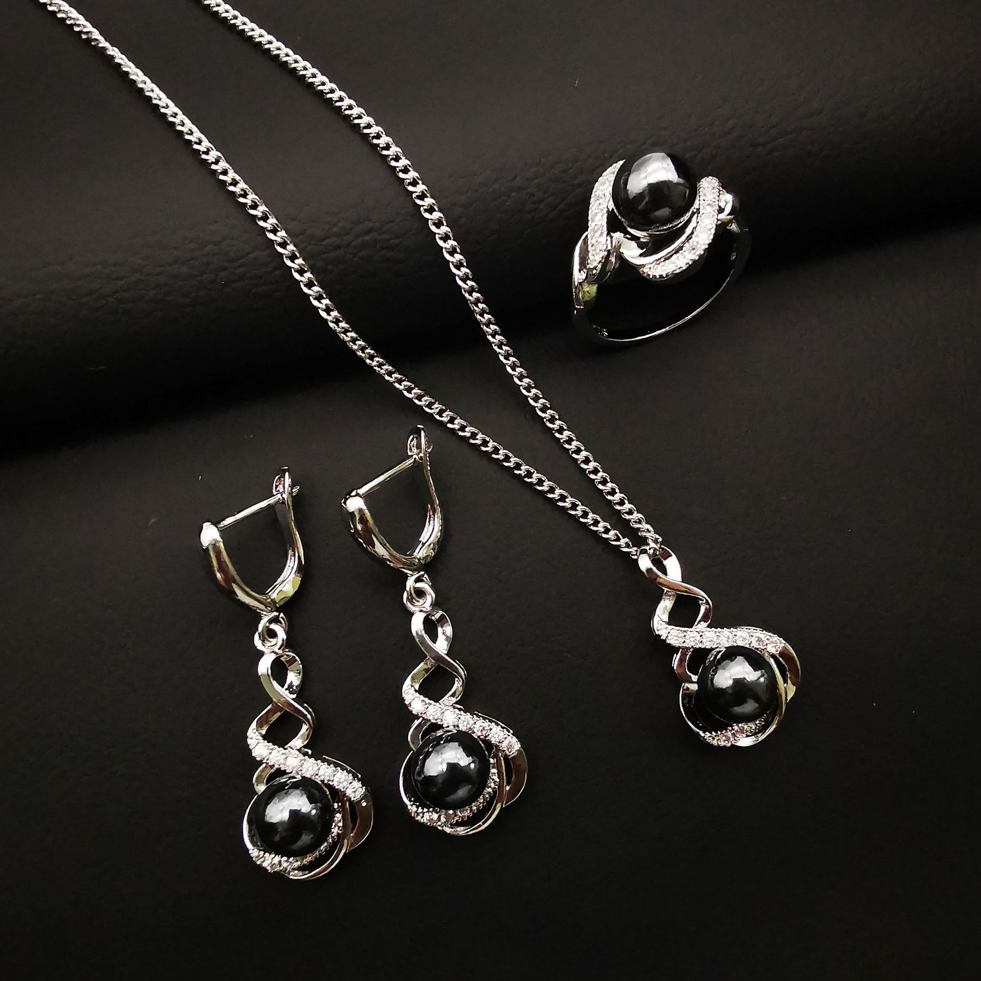 Black beads, necklace and earrings, ring