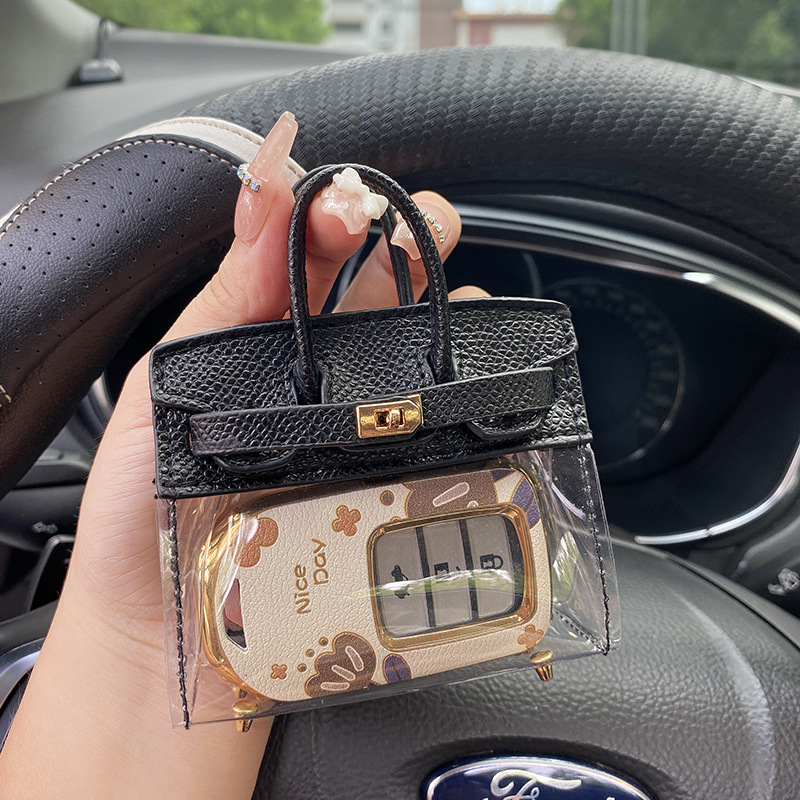 Funda para llaves de coche para mujer de celebridades de Internet 2023 nuevo coche exquisito llave universal mini bolso monedero