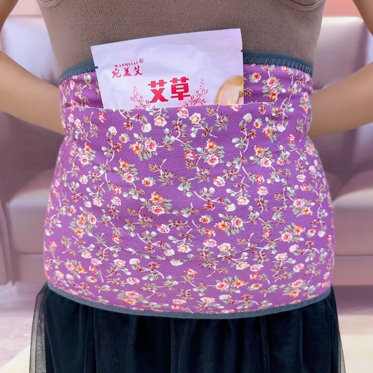 絨徳保温腰をかばっている男性女性は腹部を修理してお腹を温めます。|undefined