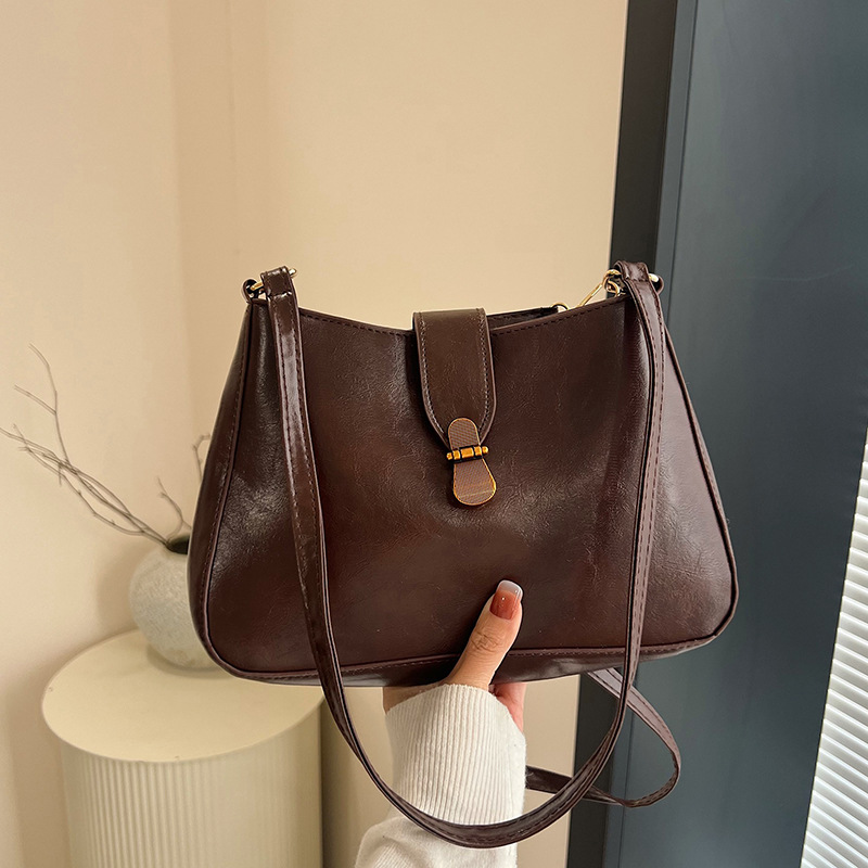 Nichezhong retro simple bolso de brazo bolso de mujer 2025 primavera nueva moda bolso pequeño de viaje de moda mochila de hombro