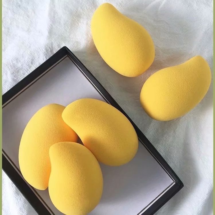 Mango huevo de maquillaje, polvo de fruta, polvo de maquillaje, esponja de maquillaje, pó de maquillaje, ropa seca y húmeda, venta directa de fábrica