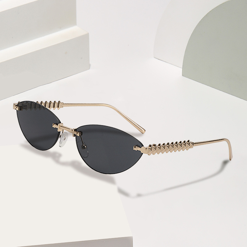 Metálico transfronterizo Europa y América de moda gafas de sol con ojos de gato, gafas de sol sin marco, gafas de sol personales