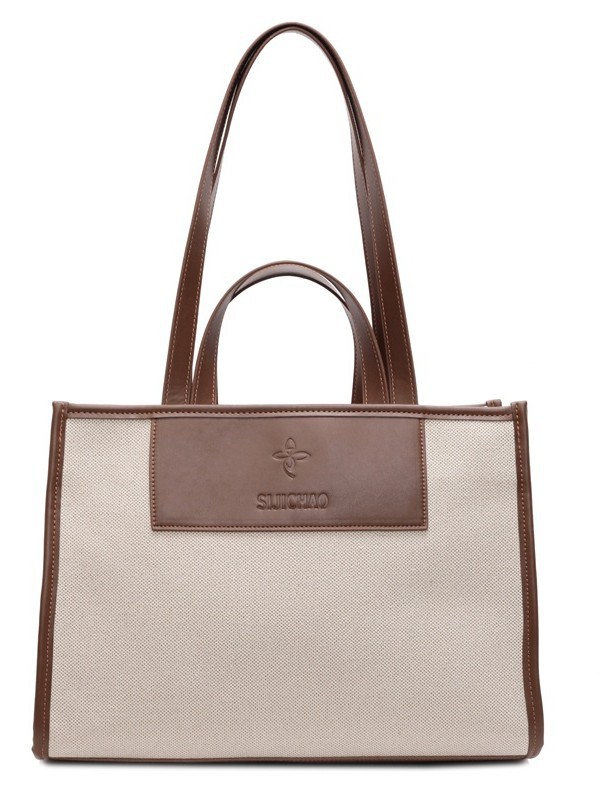 Bolsa de mano de lona de gran capacidad para mujeres caliente nueva moda simple alta textura mochila de viaje