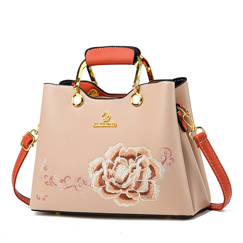 Regalo de temperamento de nicho para mamá 2025 nuevo estilo para suegra y ancianos bolso de hombro bordado elegante y de moda