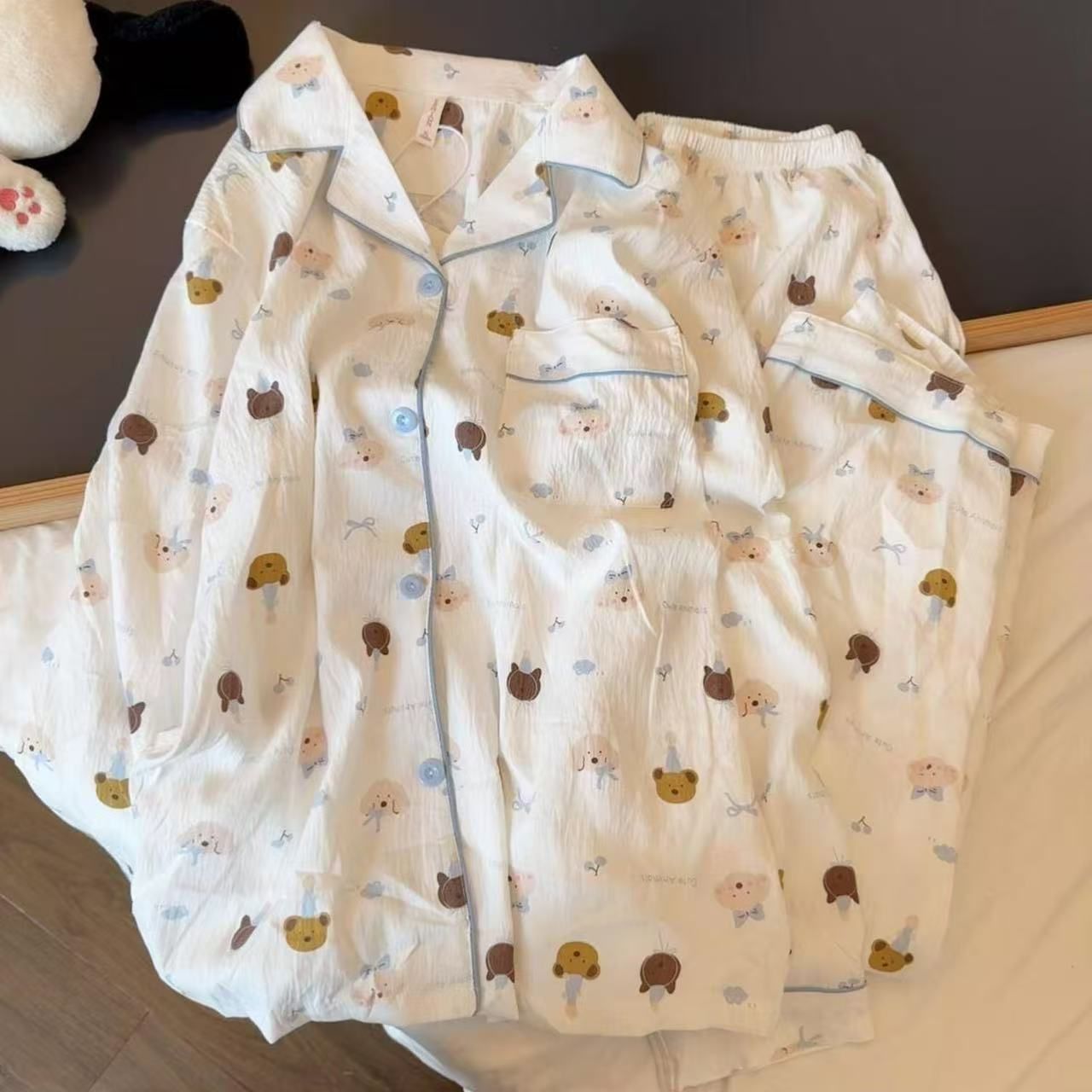 Al por mayor transfronterizo KT gato pijama mujer primavera y otoño nubes algodón manga larga 2026 nuevo juego de ropa de hogar encantadora super caliente