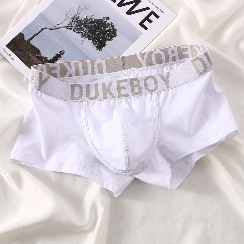 Ropa interior de hombre de gama alta hilo de algodón transpirable cómodo boxeadores simples U convexa bolsa grande Mediados de cintura Boxer pantalones cortos pantalones de cabeza