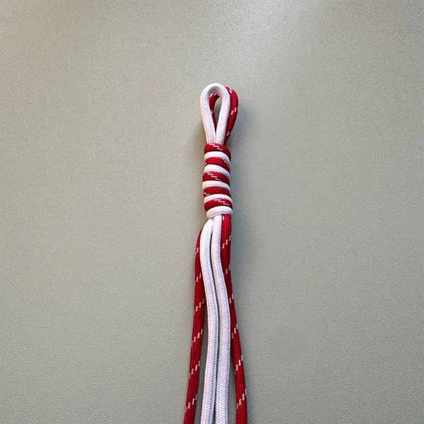 E11 knot red with white