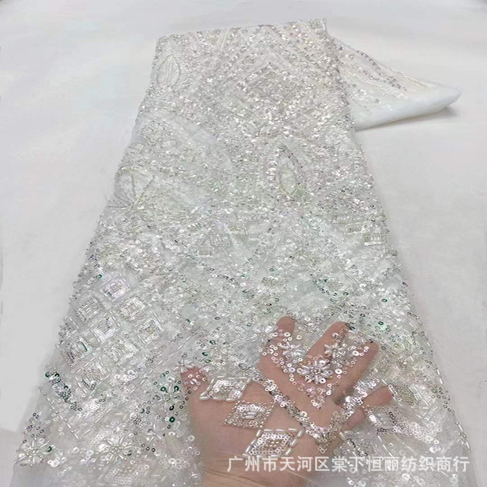 Vestido de boda negro de moda compuesto de clavos hechos a mano Europa y América bordado flor floral textil vestido bordado tela nueva