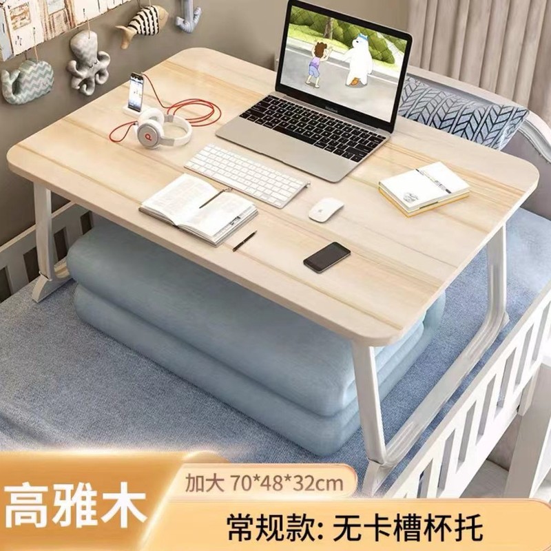 携帯用ベッドの上の小さなテーブルが窓をはねて折りたたみます。|undefined
