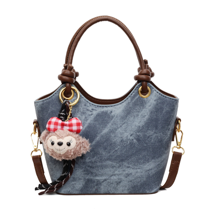 Bolsa de mano de alto nivel, bolso de cubo de moda, mujer, otoño y invierno, 2025, nuevo tipo de bolso de hombro casual, bolso de mochila universal.