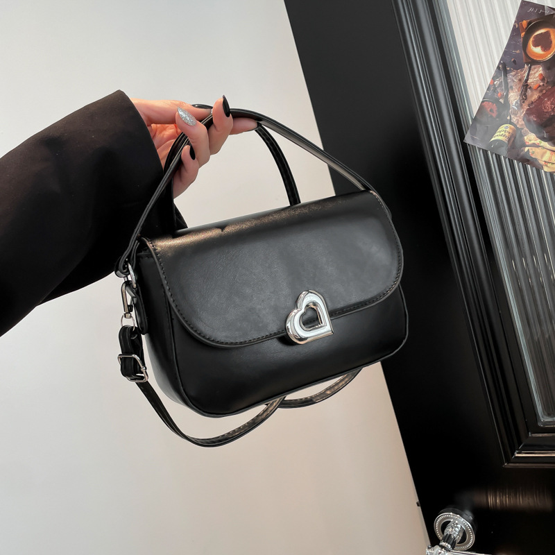 Texturas extranjeras bolsas de mano debajo de las axilas mujeres 2024 invierno nuevo estilo de moda bolsa de silla casuales bolsas de hombro