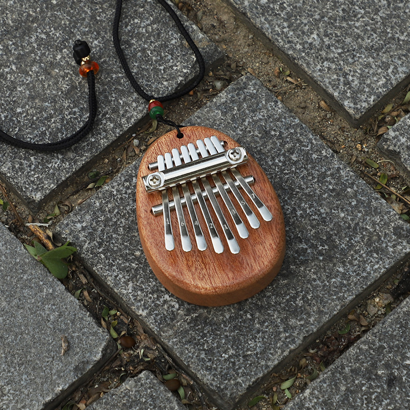 En stock al por mayor 8-tono pulgar piano mini kalinba piano dedo piano Cristal Kalimba pulgar piano pequeño instrumento musical