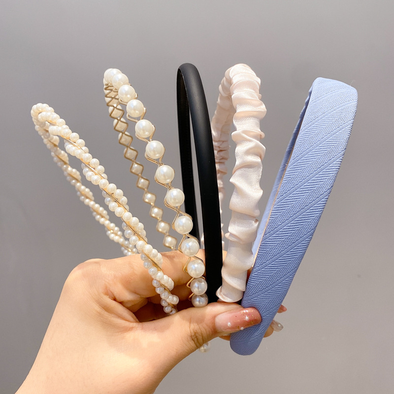 A principios de la primavera, la banda de cabello para mujeres en línea, 2025 nuevo lavado de cara de presión de tarjeta de cabello para el cabello, banda de cabello de perlas, banda de cabello para mujeres.