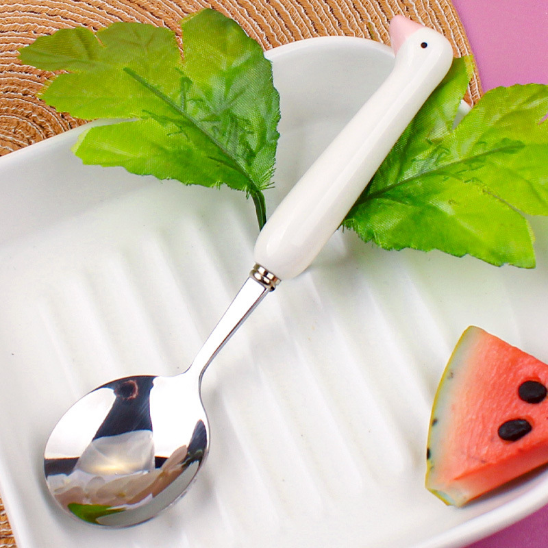 Svanformad sked i rostfritt stål med keramiskt handtag_voghion.com