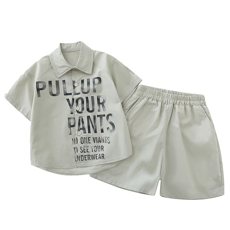 7192 traje de verano para niños 2025 nueva camisa con estampado de letras de manga corta de estilo occidental verano de dos piezas para niños verano