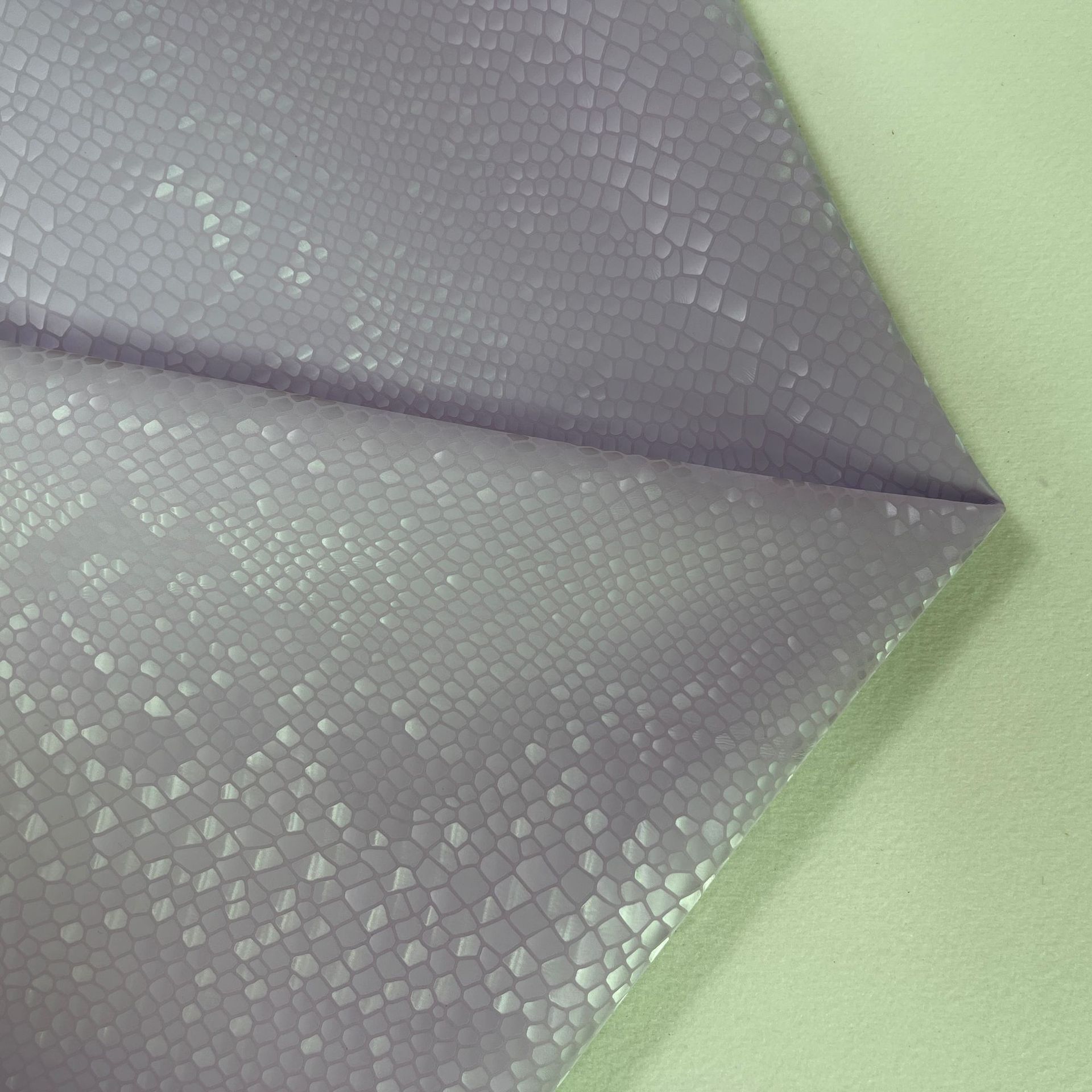 Fabricante spot PU equipaje de cuero artificial material de cuero brillante patrón de serpiente de alto brillo patrón de escamas de dragón bolso de cuero embalaje de la carcasa del teléfono móvil