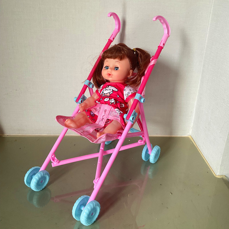 Comercio exterior caja transfronteriza niños gordos carro de música muñeca niño niña pequeña educación temprana juguetes caminantes