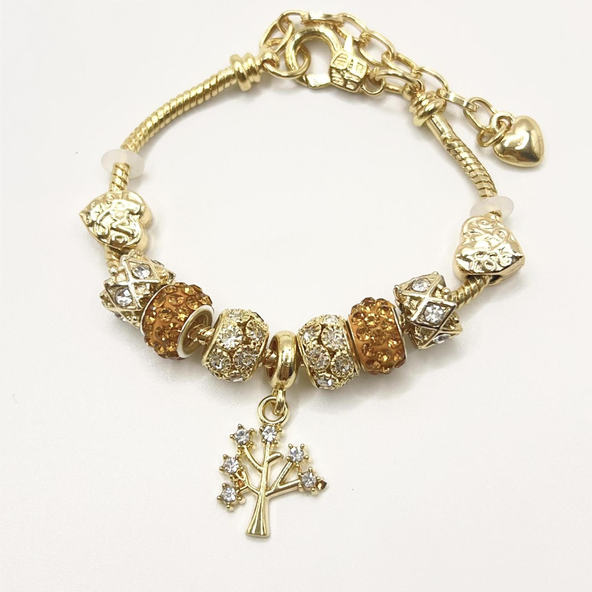 春夏の新型の小清新で甘い少女風のストライプの花の愛の蝶の数珠のブレスレットの透かし彫りのダイヤモンドの手の串