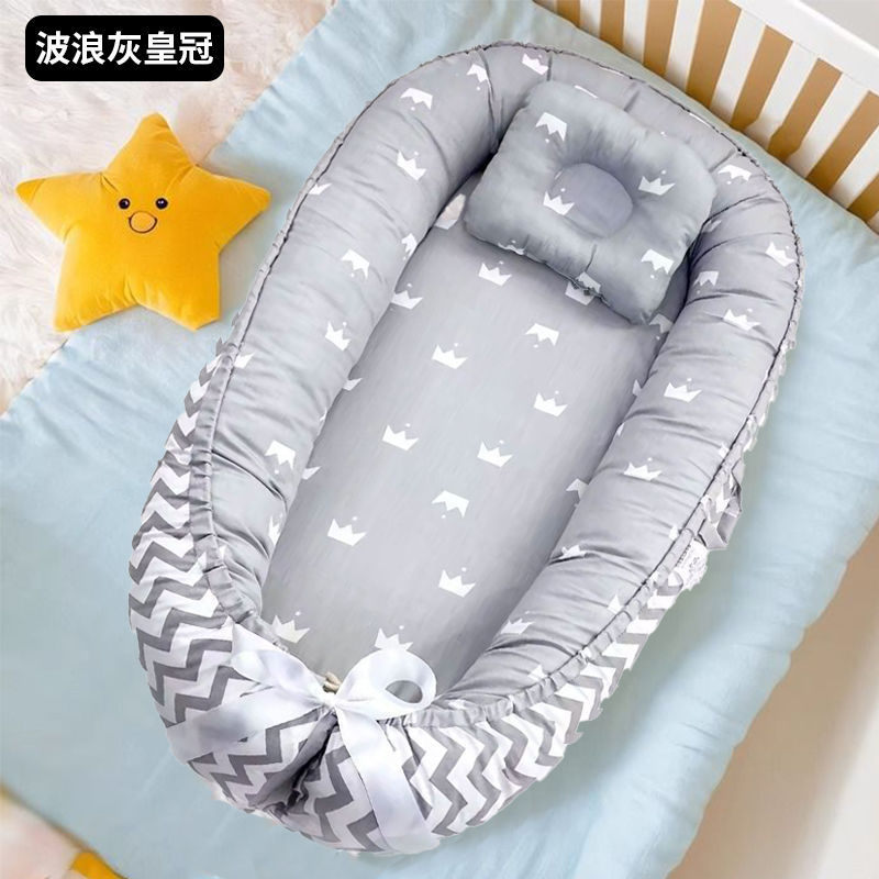 Cama de bebé portátil desmontable transfronteriza en la cama media para recién nacidos acostados para dormir