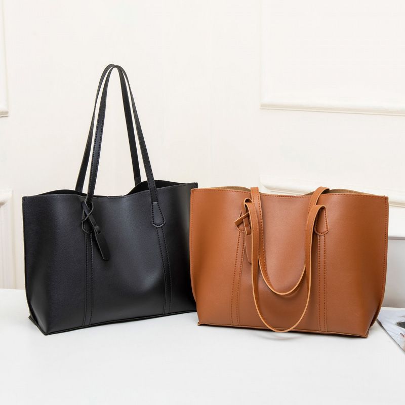 2025 otoño y invierno nuevo nicho Zhong tote bolso de cuero suave de gran capacidad para mujeres bolso de viaje de alta calidad bolso de hombro ocio