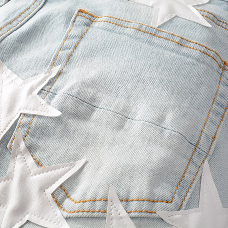 Jean homme slim fit élastique avec trous aux genoux et étoiles_voghion.com