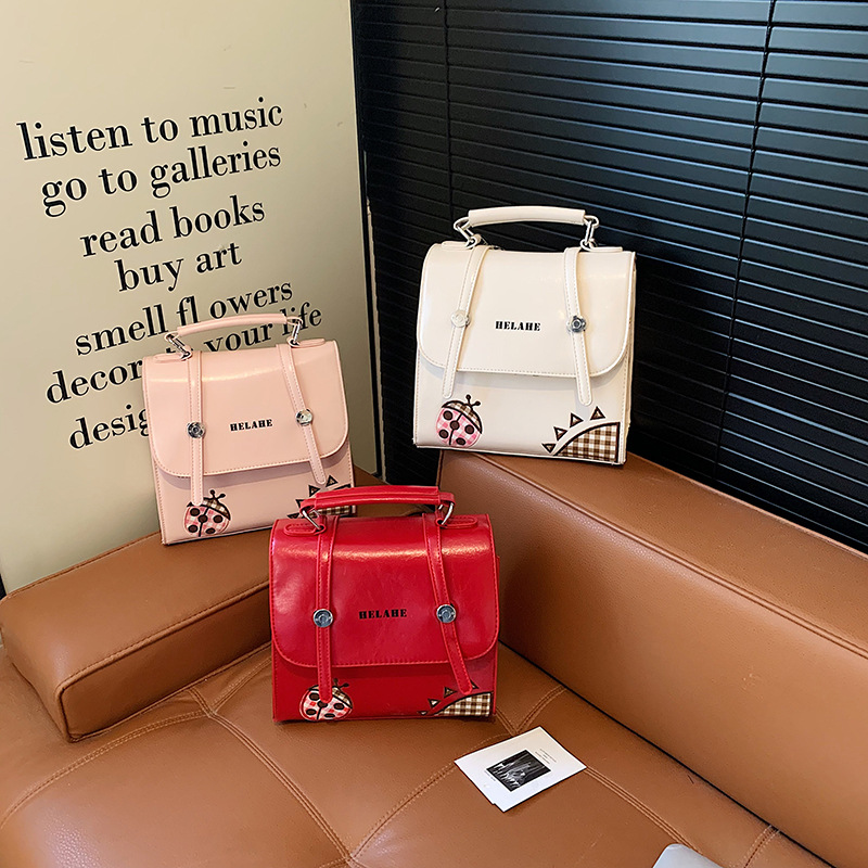 Mochila de moda coreana popular para niños y niñas, lindas mochilas de impresión de mariposas 2026 nuevas mochilas para niños