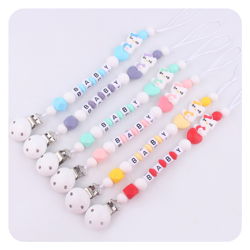 Bebé blanco tetina clips juguetes KT gatos silicona tetina cadena cadena de cadena Aliexpress Amazon explosión