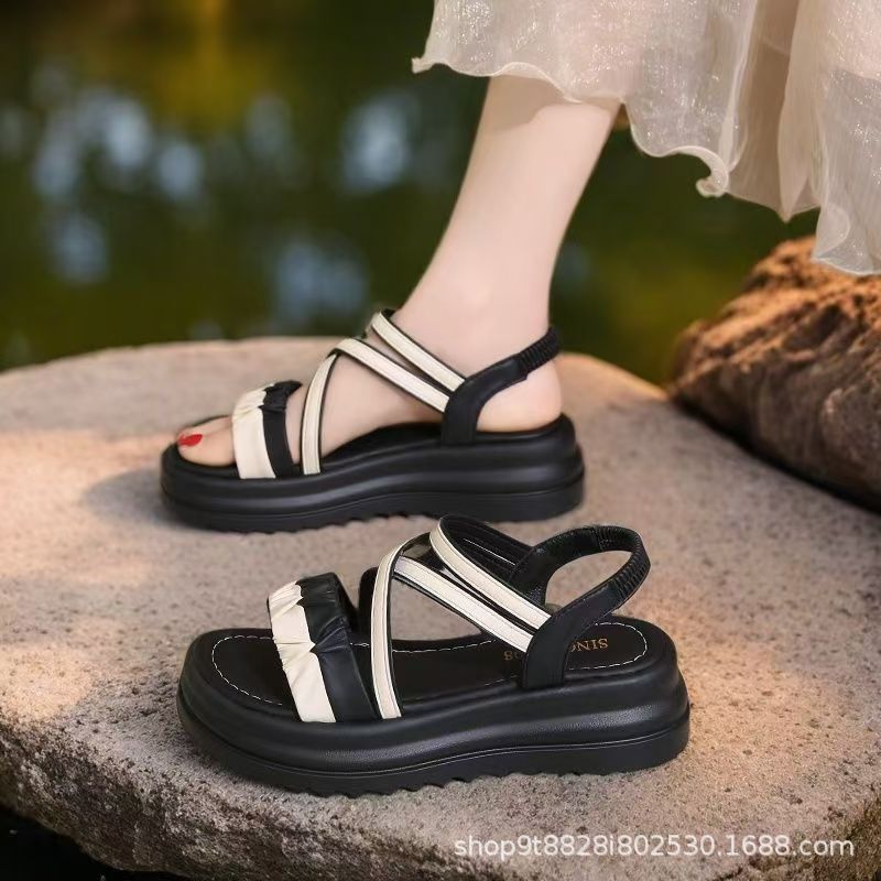 2026 verano coreano nuevo fondo suave sandallas de playa de fondo grueso antideslizante francés red roja dos zapatillas de playa para mujeres