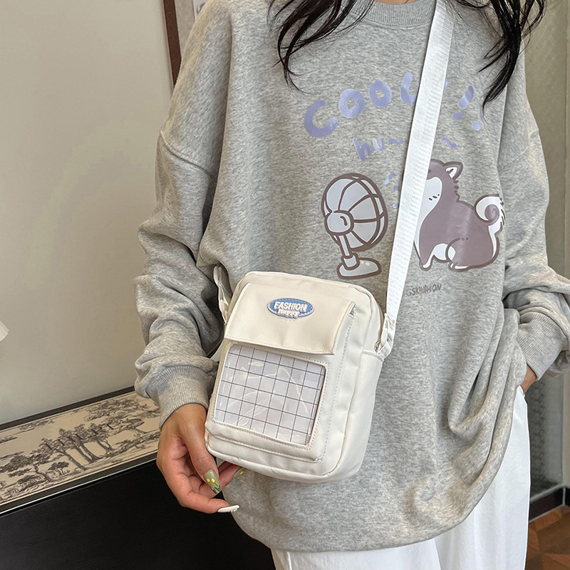 Coreana lindos bolsos transparentes mujeres 2024 nuevo tipo de bolsos portátiles versátiles para teléfonos móviles bolsos de hombro para estudiantes