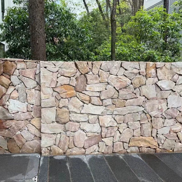 Natural cultural stone background wall for villa exterior, yellow wood grain mosaic stones, irregular courtyard rough stone slabs for garden paving Natural cultural stone background wall for villa exterior, yellow wood grain mosaic stones, irregular courtyard rough stone slabs for garden paving