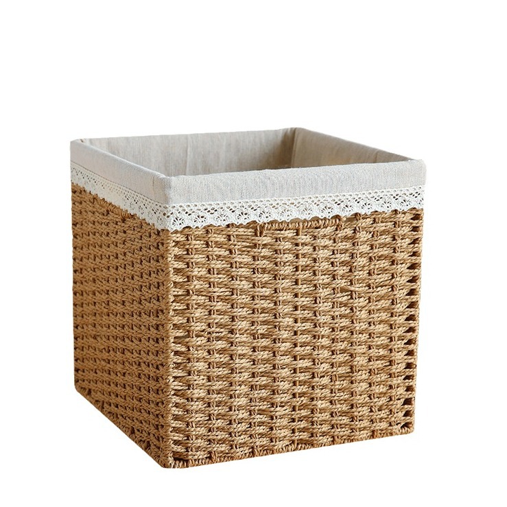 収納かごは草編みのデスクトップの間食収納かごの家庭用編みをまねて、籐編みのおもちゃ収納ケースを制定することができます。