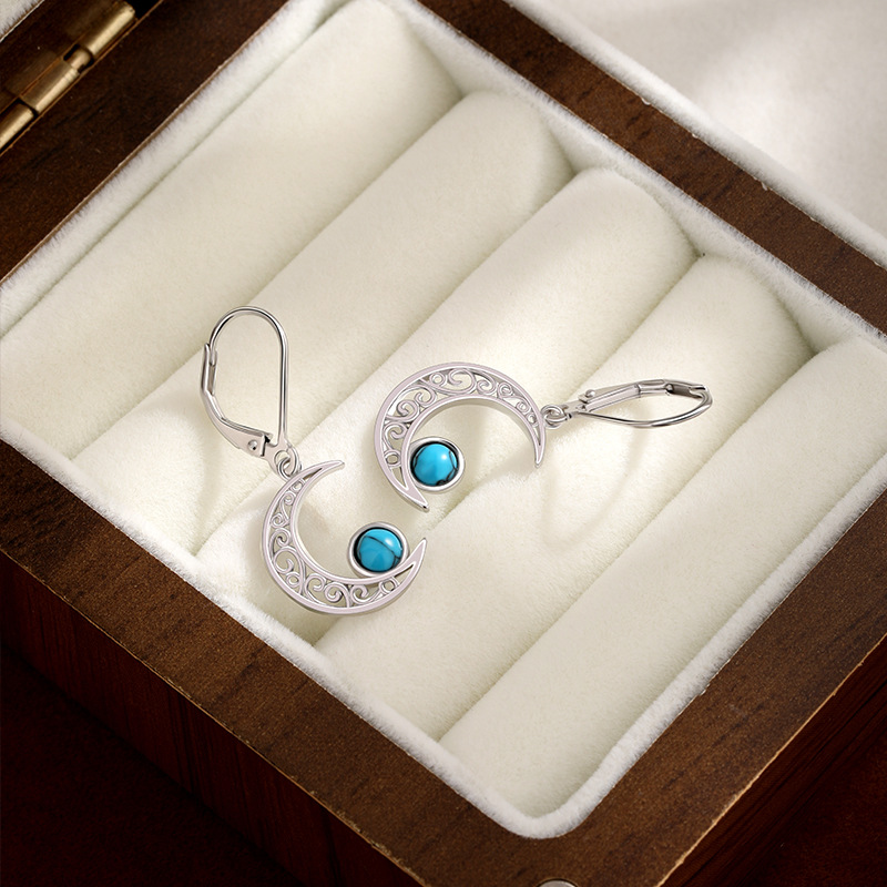 Europa y los Estados Unidos transfronterizos 925 plata esterlina turquesa pendientes de lujo ligero de lujo alto sentido celta estrella de luna pendientes de orejas